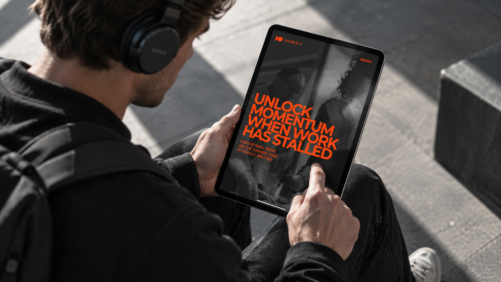 Person using the Double-O website on an iPad